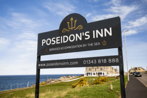 Poseidon's Inn Sign