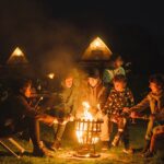 Picture of children around a camp fire