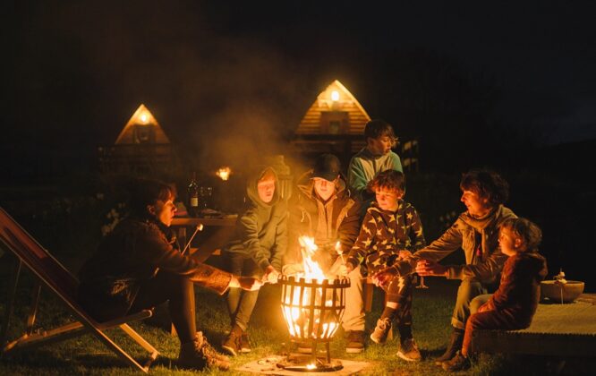 Picture of children around a camp fire