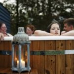 Picture of family in hot tub at The Loft