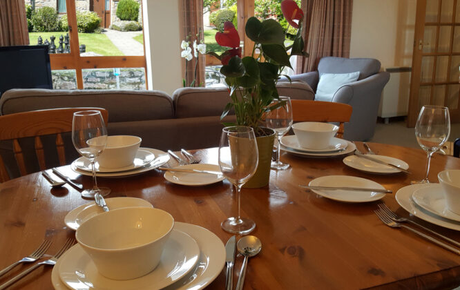 Plates and cutlery at the Carden Holiday Cottages